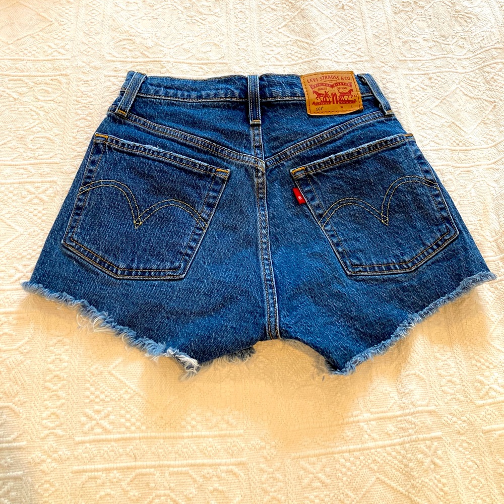 Levi Strauss daisy duke shorts with white tanktop